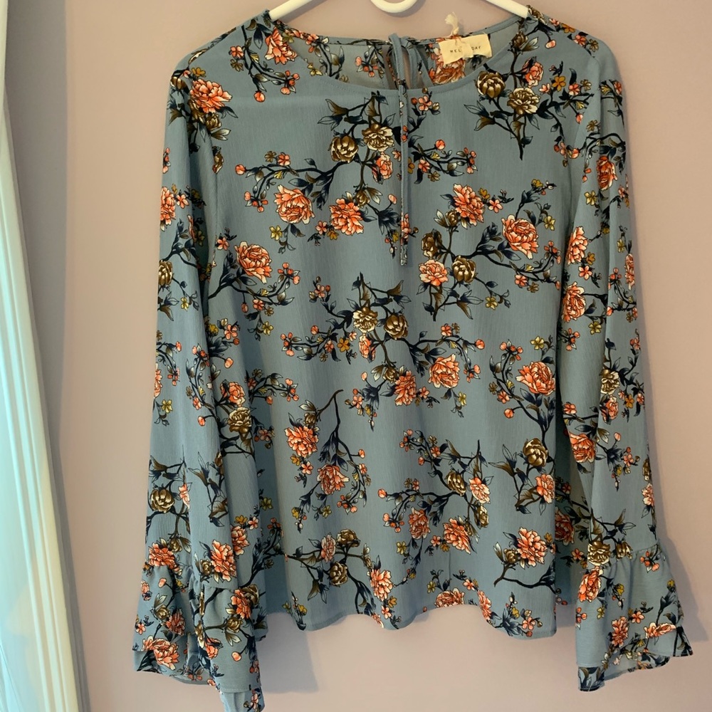 blue and floral blouse.